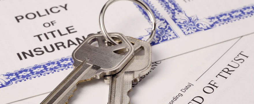 keys to house with home ownership documents